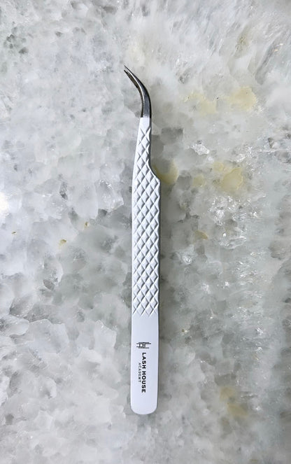 Curved tweezer: fibre tip